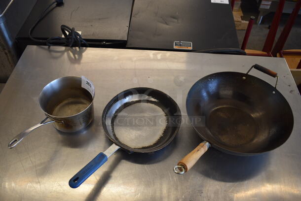 3 Various Metal Items; Sauce Pan, Skillet and Wok Skillet. Includes 13x7.5x4.5. 3 Times Your Bid!