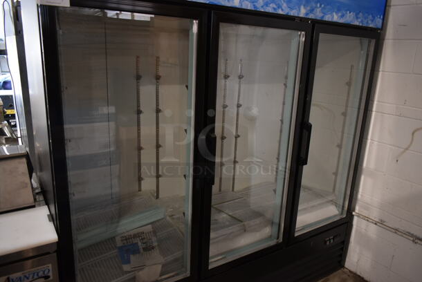 BRAND NEW SCRATCH AND DENT! 2023 Avantco 178GDC69HCB Metal Commercial 3 Door Reach In Cooler Merchandiser w/ Poly Coated Racks. 115 Volts, 1 Phase. Stock Picture Used as Gallery. Tested and Working! - Image 3 of 9