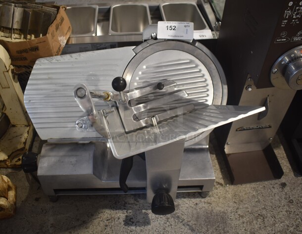 Fleetwood Stainless Steel Commercial Countertop Meat Grinder w/ Blade Sharpener. Tested and Powers On But Parts Do Not Move - Image 1 of 4