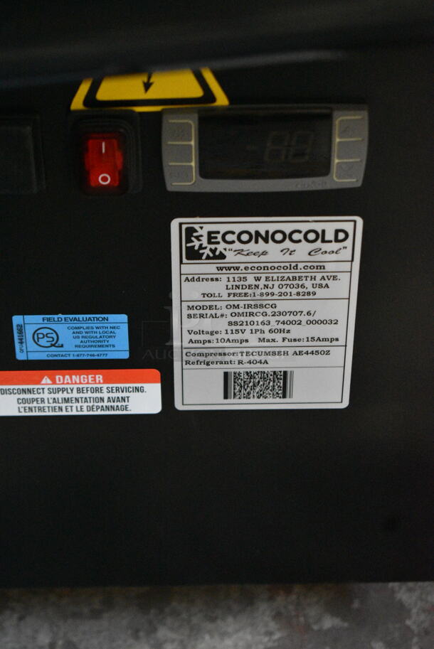 BRAND NEW SCRATCH AND DENT! Econocold OM-IRSSCG Metal Commercial Floor Style Self Contained Island Fridge Curved Glass on Commercial Casters. 115 Volts, 1 Phase. Tested and Working! - Image 5 of 5