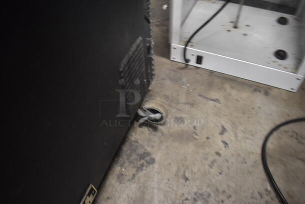 True GDM-07F Commercial Stainless Steel Countertop Merchandiser Freezer With Polycoated Shelves On Commercial Casters With Black Cabinet. 115V, 1 Phase. Tested and Powers On But Does Not Get Cold - Image 7 of 8