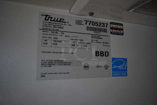 2013 True TG1R-1S ENERGY STAR Stainless Steel Commercial Single Door Reach In Cooler w/ Poly Coated Racks on Commercial Casters. 115 Volts, 1 Phase. Tested and Working! - Image 6 of 7