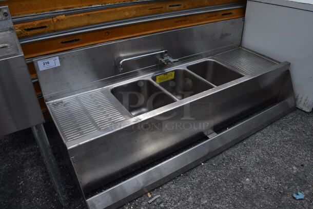 Stainless Steel Commercial 3 Bay Sink w/ Dual Drain Boards, Faucet, Handles and Speedwell. Does Not Have Legs. 60x22x22. Bays 10x14x10. Drain Boards 12x16x1