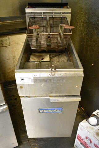Imperial Stainless Steel Commercial Floor Style Natural Gas Powered Deep Fat Fryer w/ 2 Metal Fry Baskets. This Unit Was In Working Condition When the Restaurant Closed. (kitchen)