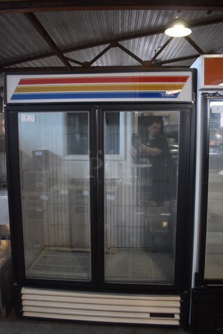 True GDM-49F Commercial Stainless Steel 2 Glass Door Merchandiser Freezer With Polycoated Shelves. 115V, 1 Phase. Cannot Test Due To Plug Style