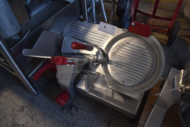 BRAND NEW SCRATCH AND DENT! 2022 Berkel B12-SLC Stainless Steel Commercial Countertop Meat Slicer w/ Blade Sharpener. Missing Center Plate Locking Knob. 115 Volts, 1 Phase. 26x22x21. Tested and Working! - Image 2 of 6