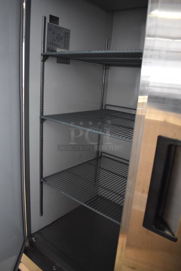EXCELLENT CONDITION! Avantco 178A49RHC Stainless Steel Commercial 2 Door Reach In Cooler w/ Poly Coated Racks on Commercial Casters. 115 Volts, 1 Phase. 54x33x82.5. Tested and Working! - Image 6 of 8