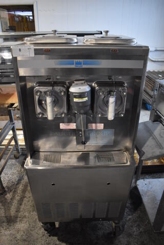 2013 Taylor 342D-27 Stainless Steel Commercial Floor Style Air Cooled 2 Flavor Frozen Beverage Machine w/ Drink Mixer Attachment on Commercial Casters. 208-230 Volts, 1 Phase. 27.5x33x60