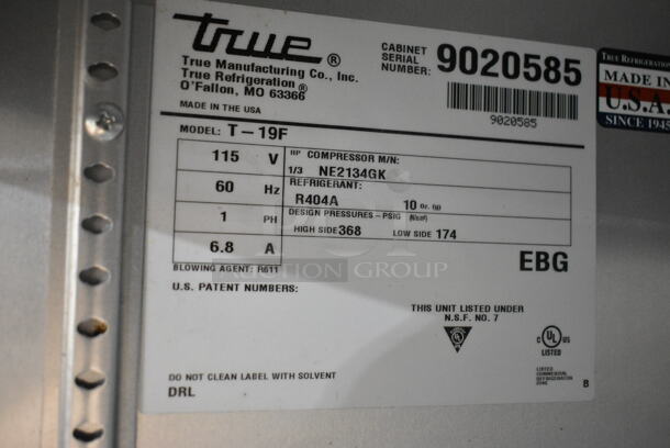 2017 True T-19F Stainless Steel Commercial Single Door Reach In Cooler w/ Poly Coated Racks on Commercial Casters. 1 Caster Needs To Be Reattached. 115 Volts, 1 Phase. Tested and Working! - Image 7 of 7