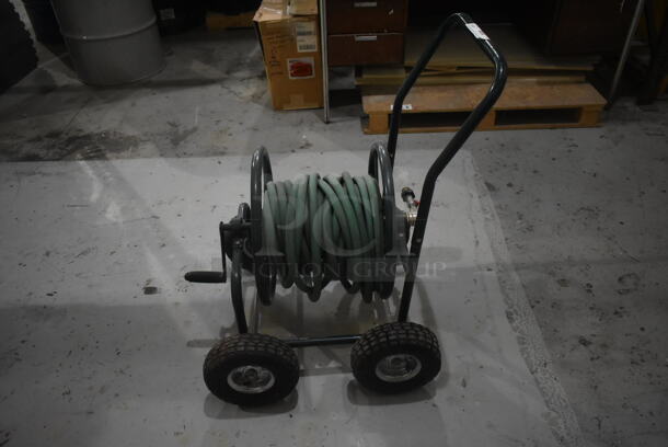 Metal Black Hose Reel w/ Green Hose on Casters. - Image 1 of 4