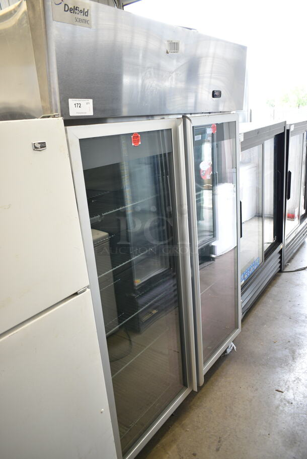 2015 Delfield LSR2-G Stainless Steel Commercial 2 Door Reach In Cooler Merchandiser w/ Poly Coated Racks on Commercial Casters. 115 Volts, 1 Phase. Tested and Does Not Power On
 - Image 1 of 6