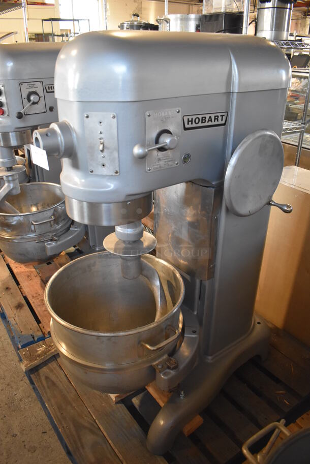 REFURBISHED! Hobart H-600 Metal Commercial Floor Style 60 Quart Planetary Dough Mixer w/ Stainless Steel Mixing Bowl and Dough Hook Attachment. 230 Volts, 1 Phase. Unit Has Been Professionally Refurbished! 28x40x56