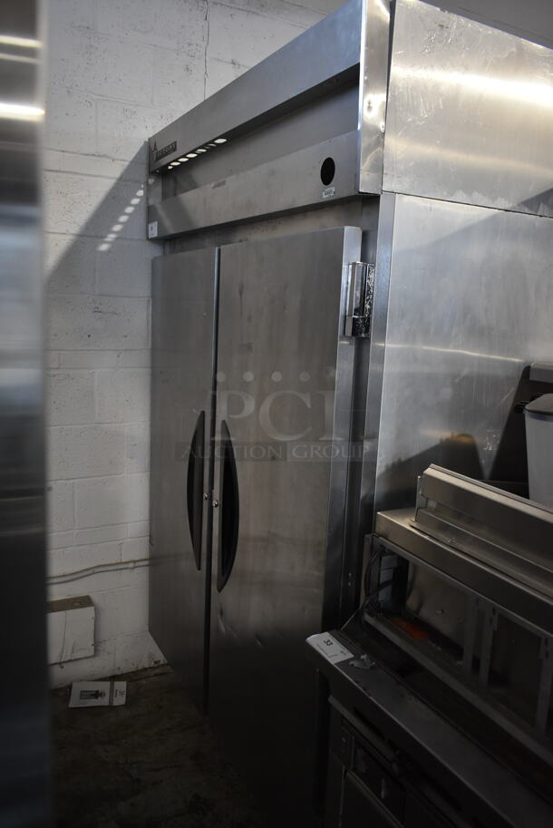 Victory VF-2 Stainless Steel Commercial 2 Door Reach In Freezer w/ Poly Coated Racks on Commercial Casters. 115 Volts, 1 Phase. Cannot Test Due To Cut Power Cord