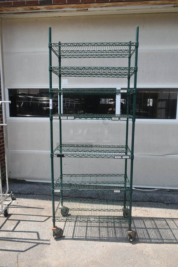 Green Finish 7 Tier Wire Shelving Unit on Commercial Casters. BUYER MUST DISMANTLE. PCI CANNOT DISMANTLE FOR SHIPPING. PLEASE CONSIDER FREIGHT CHARGES. - Image 1 of 4