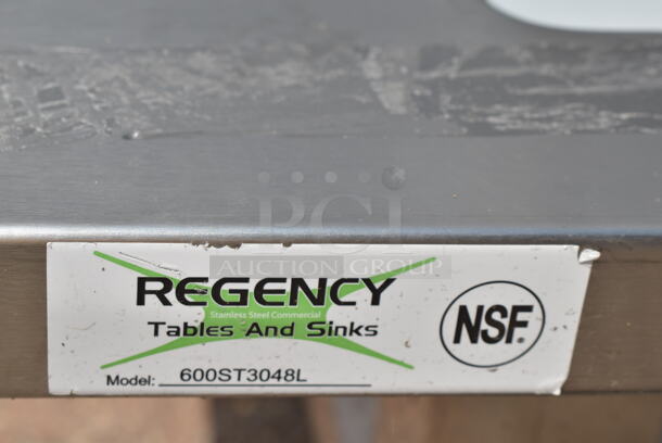 BRAND NEW SCRATCH AND DENT! Regency 600ST3048L Stainless Steel 30" x 48" 16 Gauge Stainless Steel Work Table with Sink. No Legs or Under Shelf.  - Image 6 of 6