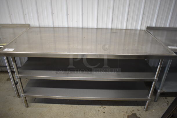 Stainless Steel Table w/ 2 Stainless Steel Under Shelves. 72x36x35.5