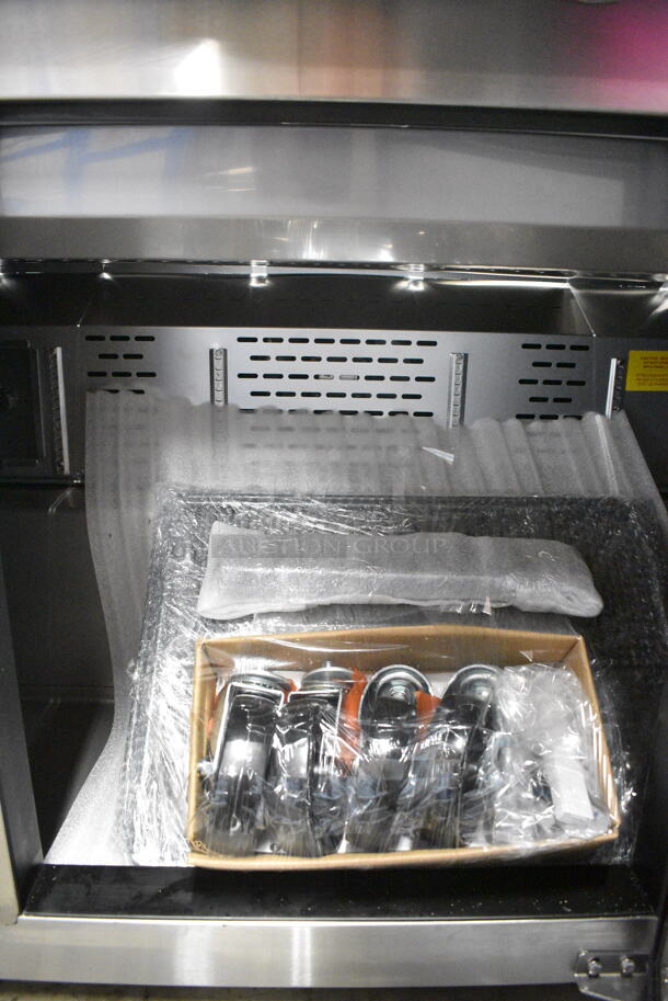 BRAND NEW SCRATCH AND DENT! 2024 Avantco 447APST72 Stainless Steel Commercial Sandwich Salad Prep Table Bain Marie Mega Top on Commercial Casters. 115 Volts, 1 Phase. Tested and Working! - Image 7 of 10