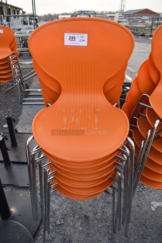 7 Dining Chairs w/ Orange Seat on Metal Legs. 20x20x32. 7 Times Your Bid!