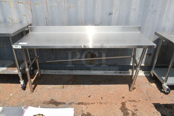 Regency Stainless Steel Table w/ Back Splash and Metal Under Shelf. - Image 1 of 3