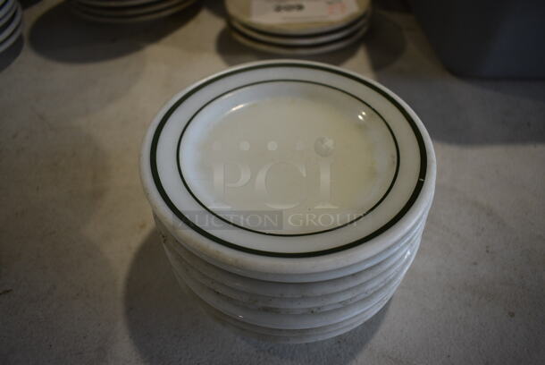 10 White Ceramic Plates w/ Green Lines on Rim. 5.5x5.5x1. 10 Times Your Bid!