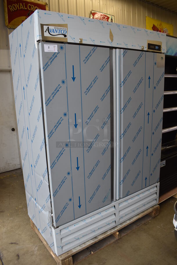 BRAND NEW SCRATCH AND DENT! 2022 Avantco 447AP49R Stainless Steel Commercial 2 Door Reach In Cooler w/ Poly Coated Racks. 115 Volts, 1 Phase. 54x31x79. Tested and Working!