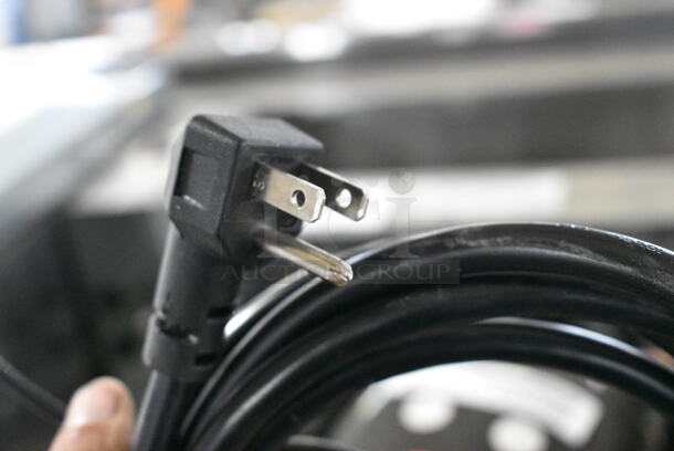 BRAND NEW SCRATCH AND DENT! 2024 Continental 2FNPTHD Stainless Steel Commercial 4 Half Size Door Reach In Freezer w/ Poly Coated Racks and Commercial Casters. 115 Volts, 1 Phase. Tested and Working! - Image 9 of 9