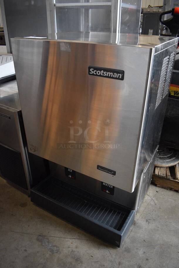 Scotsman Model MDT5N25A-1J Stainless Steel Commercial Ice Machine w/ Ice and Water Dispenser. 115 Volts, 1 Phase. 26x21x41
