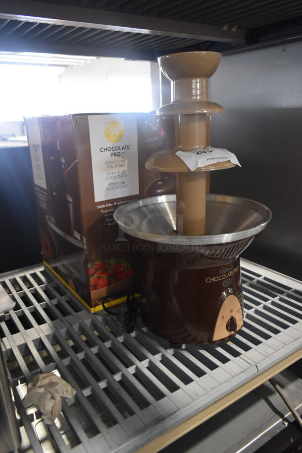 BRAND NEW SCRATCH AND DENT! Wilton TL-094 Chocolate Pro Metal Countertop Chocolate Fountain. - Image 2 of 9