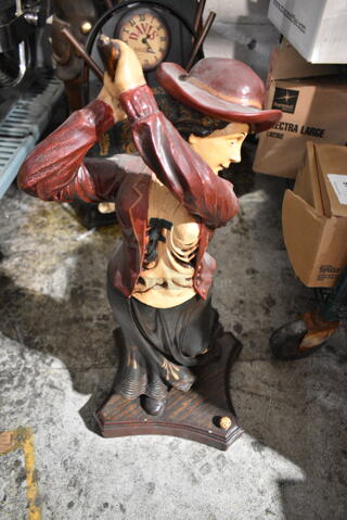 Golfing Woman Statue