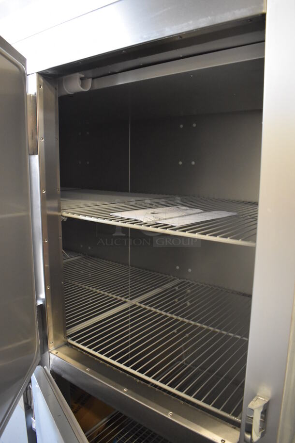 BRAND NEW SCRATCH AND DENT! Traulsen G31003 Stainless Steel Commercial 6 Half Size Reach In Door Freezer w/ Poly Coated Racks on Commercial Casters. 115 Volts, 1 Phase. 76x34x83. Tested and Working! - Image 4 of 8