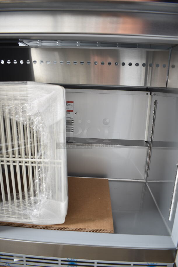 BRAND NEW SCRATCH AND DENT! Beverage Air SPE60HC-10 Stainless Steel Commercial Elite Series 60" 2 Door Refrigerated Sandwich Prep Table on Commercial Casters. 115 Volts, 1 Phase. Tested and Working! - Image 7 of 12