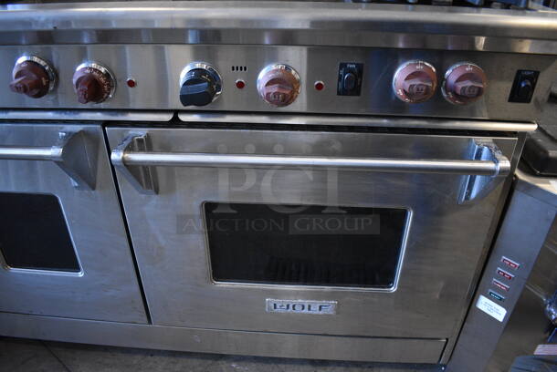 Wolf Stainless Steel Commercial Natural Gas Powered 4 Burner Range w/ Flat Top, Charbroiler, Convection Oven, Warmer, Over Shelf and Back Splash. 48x28x57 - Image 4 of 11