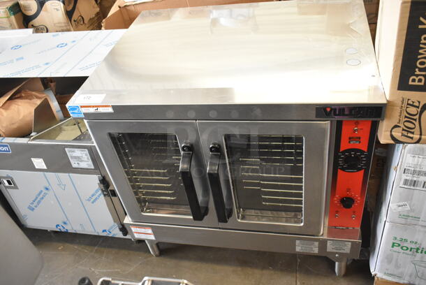 BRAND NEW SCRATCH AND DENT! Vulcan VC4ED Stainless Steel Commercial Electric Powered Full Size Convection Oven w/ View Through Doors, Metal Oven Racks and Thermostatic Controls on Metal Legs. See Pictures for Smaller Legs Than The Gallery Shows. 480 Volts, 1/3 Phase.  - Image 5 of 8