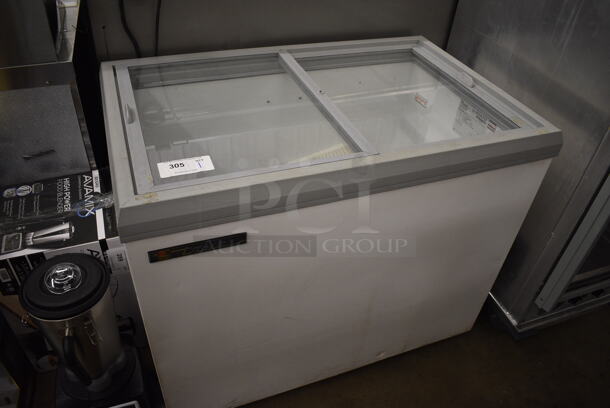 2016 True TFM-41FL Metal Commercial Chest Freezer Merchandiser on Commercial Casters. 115 Volts, 1 Phase. 41.5x26x36. Tested and Does Not Power On - Image 1 of 6
