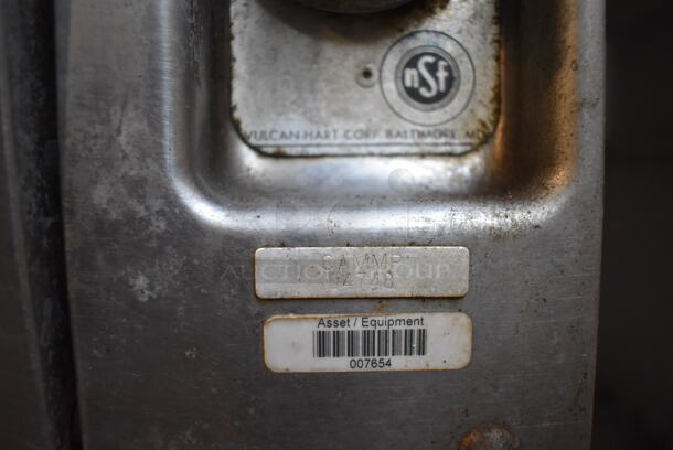 Vulcan Stainless Steel Commercial Natural Gas Powered 4 Burner Range w/ Oven, Over Shelf and Back Splash on Commercial Casters. 43.5x40x61 - Image 9 of 11