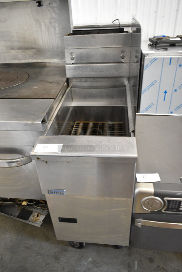 2015 Pitco Frialator SG14 Stainless Steel Commercial Floor Style Natural Gas Powered Deep Fat Fryer on Commercial Casters.  - Image 1 of 7