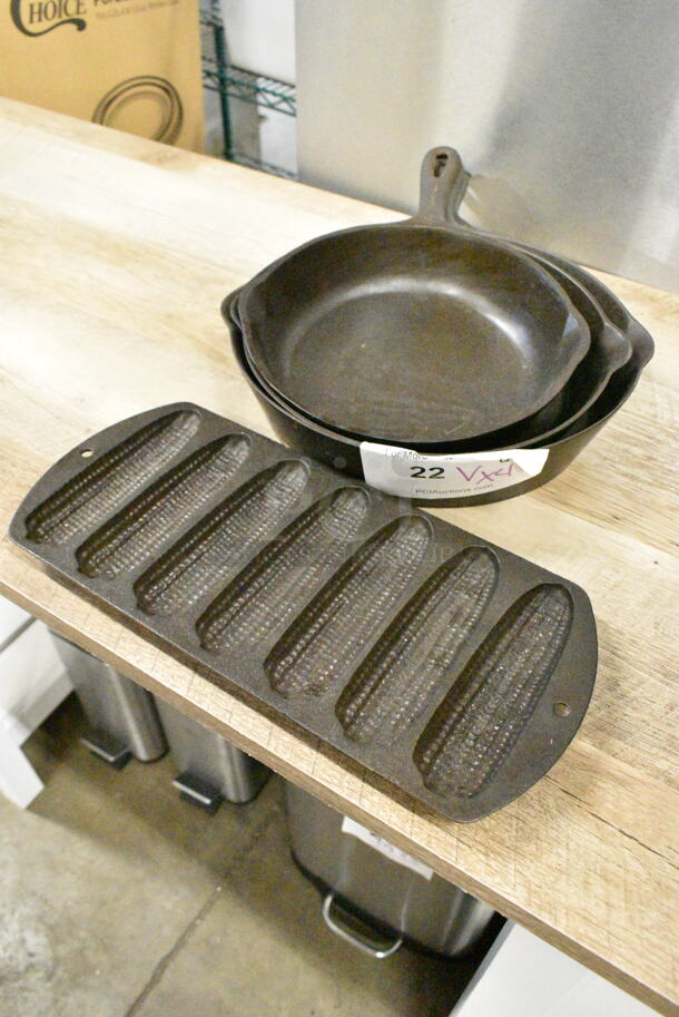 4 Various Metal Items; 3 Skillets and 1 7 Corn Cob Pan. Includes 11x13x2, 12.5x6x1. 4 Times Your Bid!  - Image 1 of 11