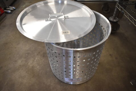 BRAND NEW SCRATCH AND DENT! Winco ALSB-60 Winco 60 Qt. Aluminum Stock Pot Steamer Basket and 471SPC60 Choice 16 15/16" Aluminum Pot / Pan Cover