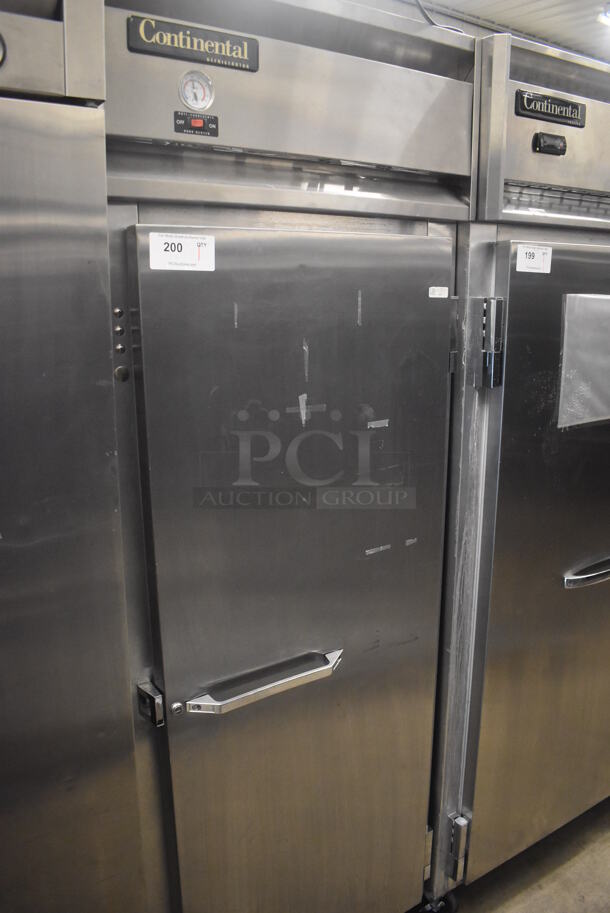 Continental 1RE Stainless Steel Commercial Single Door Reach In Cooler on Commercial Casters. 115 Volts, 1 Phase. 28.5x36x77.5. Tested and Working! - Image 1 of 5