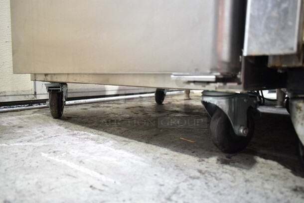 2023 Atosa MBF8001GR Stainless Steel Commercial Single Door Reach In Freezer w/ Poly Coated Racks on Commercial Casters. 115 Volts, 1 Phase. Tested and Working! - Image 2 of 4