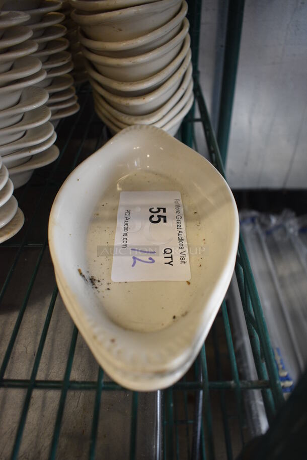 12 White Ceramic Single Serving Casserole Dishes. 10x5x1. 12 Times Your Bid!