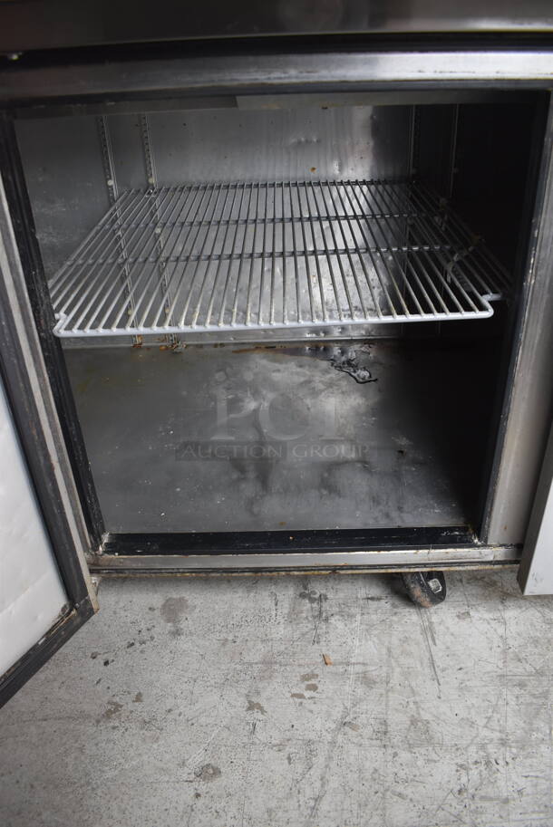 True TPP-93 Commercial Stainless Steel Pizza Prep Table With 2 Over shelves And Steel Racks on Commercial Casters. 115V/ 1 Phase. Tested And Working - Image 7 of 9