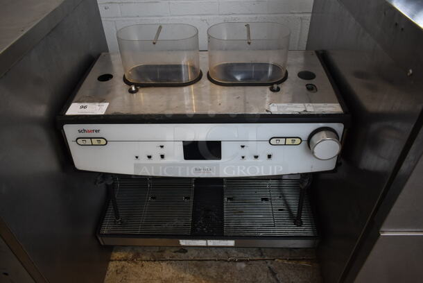 2018 Schaerer Barista Stainless Steel Commercial Countertop 2 Group Espresso Machine w/ 2 Steam Wands and 2 Hoppers. Missing Hopper Lids. 208/240 Volts, 1 Phase.
 - Image 1 of 5