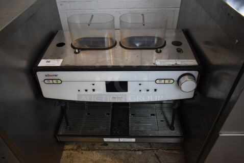 2018 Schaerer Barista Stainless Steel Commercial Countertop 2 Group Espresso Machine w/ 2 Steam Wands and 2 Hoppers. Missing Hopper Lids. 208/240 Volts, 1 Phase.
