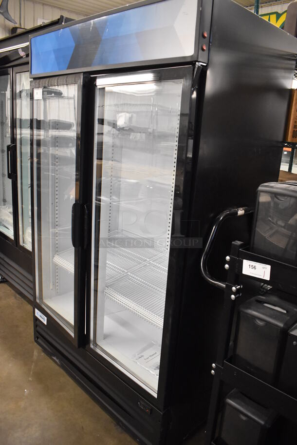 BRAND NEW SCRATCH AND DENT! KoolMore MDR-2GD-42C Metal Commercial 2 Door Reach In Cooler Merchandiser w/ Poly Coated Racks. Right Top Door Hinge Is Broken. 115 Volts, 1 Phase. 47x29x80. Tested and Working! - Image 2 of 7