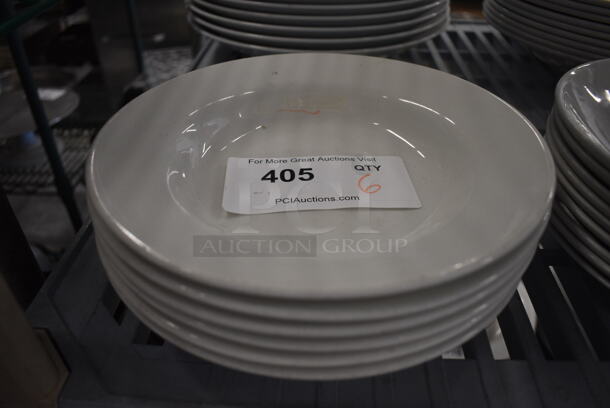 6 White Ceramic Plates. 9x9x2. 6 Times Your Bid!