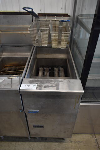 2015 Pitco Frialator SG14 Stainless Steel Commercial Floor Style Natural Gas Powered Deep Fat Fryer w/ 2 Metal Fry Baskets. 110,000 BTU.