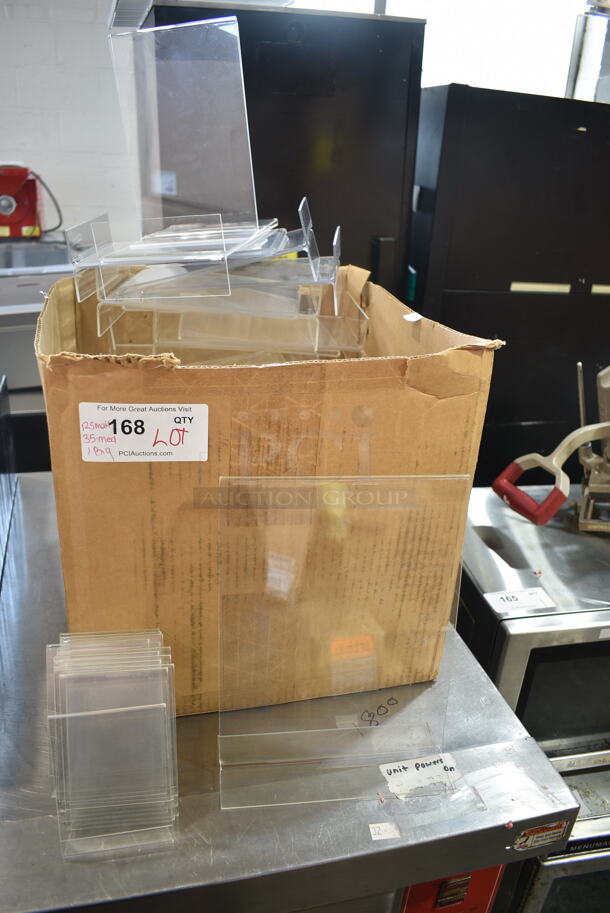 ALL ONE MONEY! Lot of Clear Poly Tabletop Paper Holders; 12 Small, 35 Medium, 1 Large. Includes 6x3x9 - Image 1 of 8