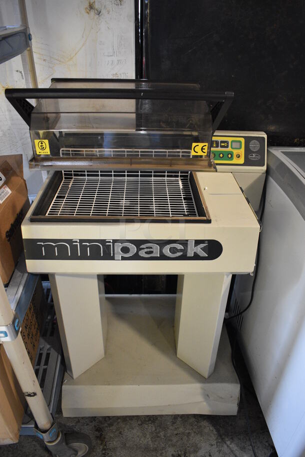 MiniPack Model Minimini Metal Floor Style Heat Sealing Machine. 115 Volts, 1 Phase. 27x18x45. Tested and Working!