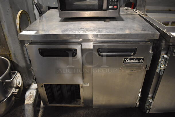 2016 Leader LB36 S/C Stainless Steel Commercial 2 Door Undercounter Cooler on Commercial Casters. 115 Volts, 1 Phase. 36x32x36. Tested and Does Not Power On